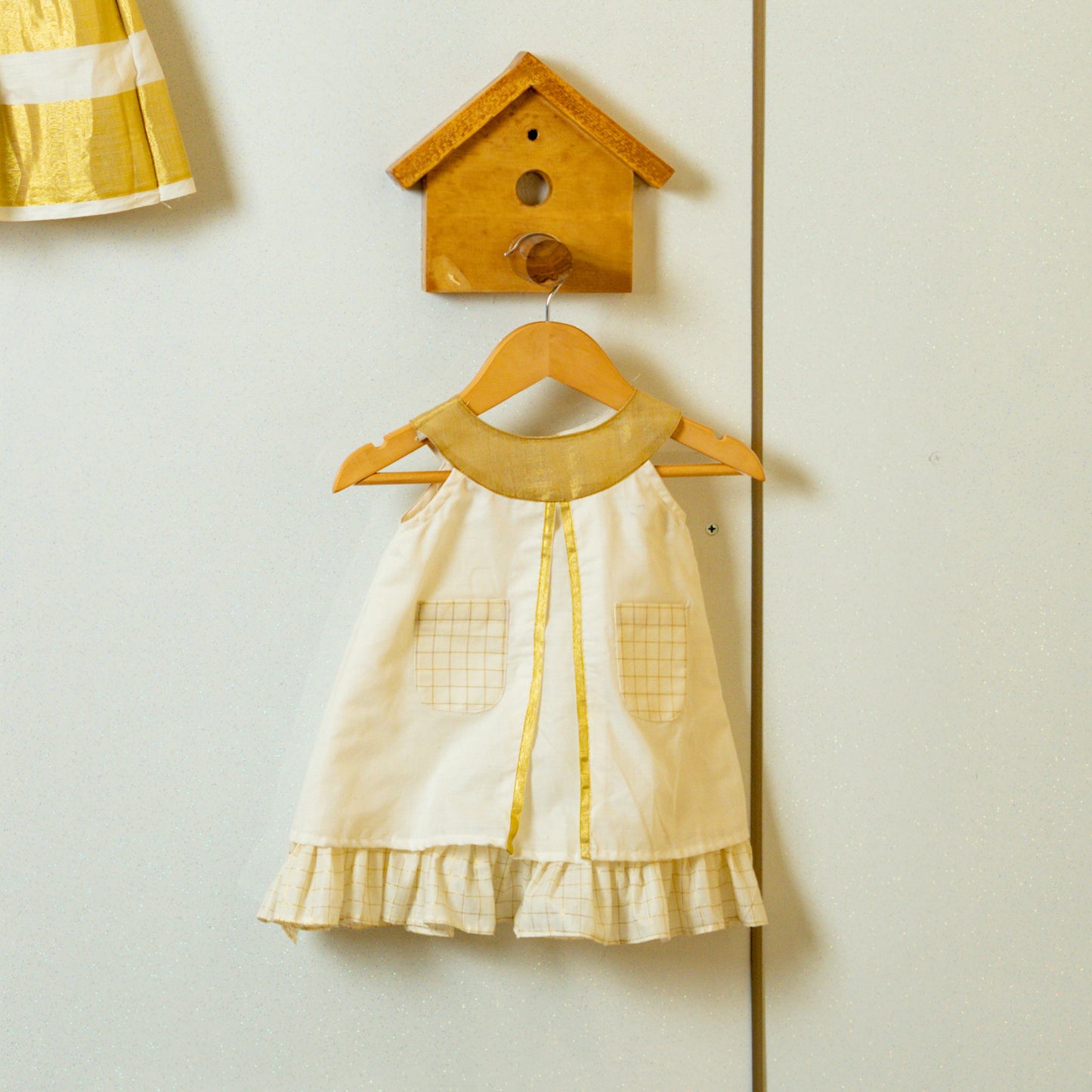 Pre Order: Two Layered Kasavu frock with designer yoke and checked pockets