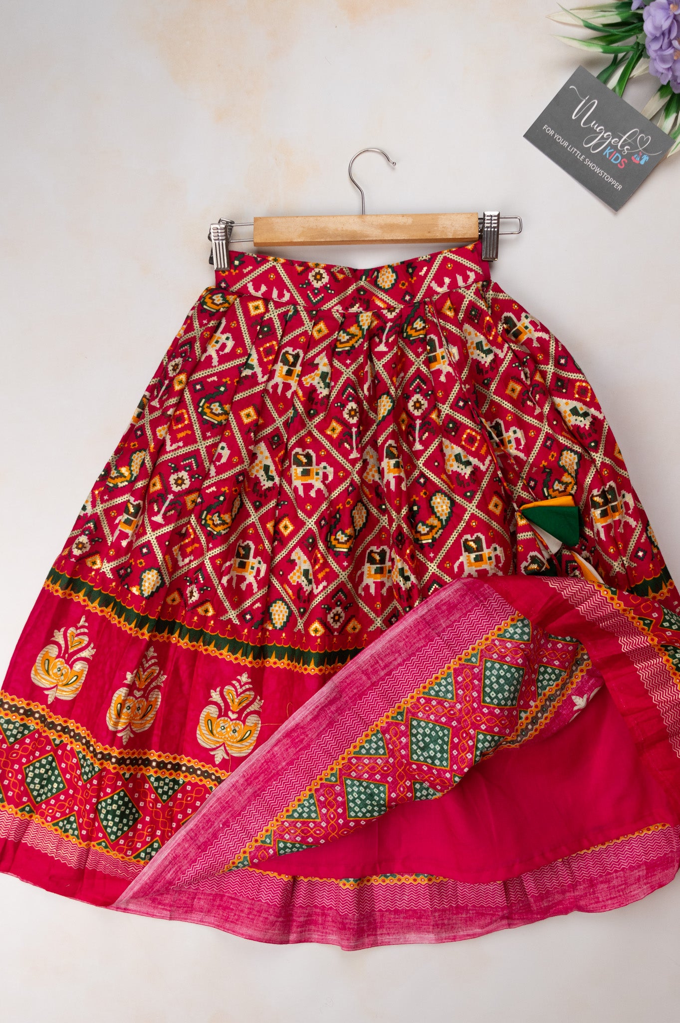 Pre Order: Multicolor Patola lehenga and patchwork designer blouse with one shoulder sleeves