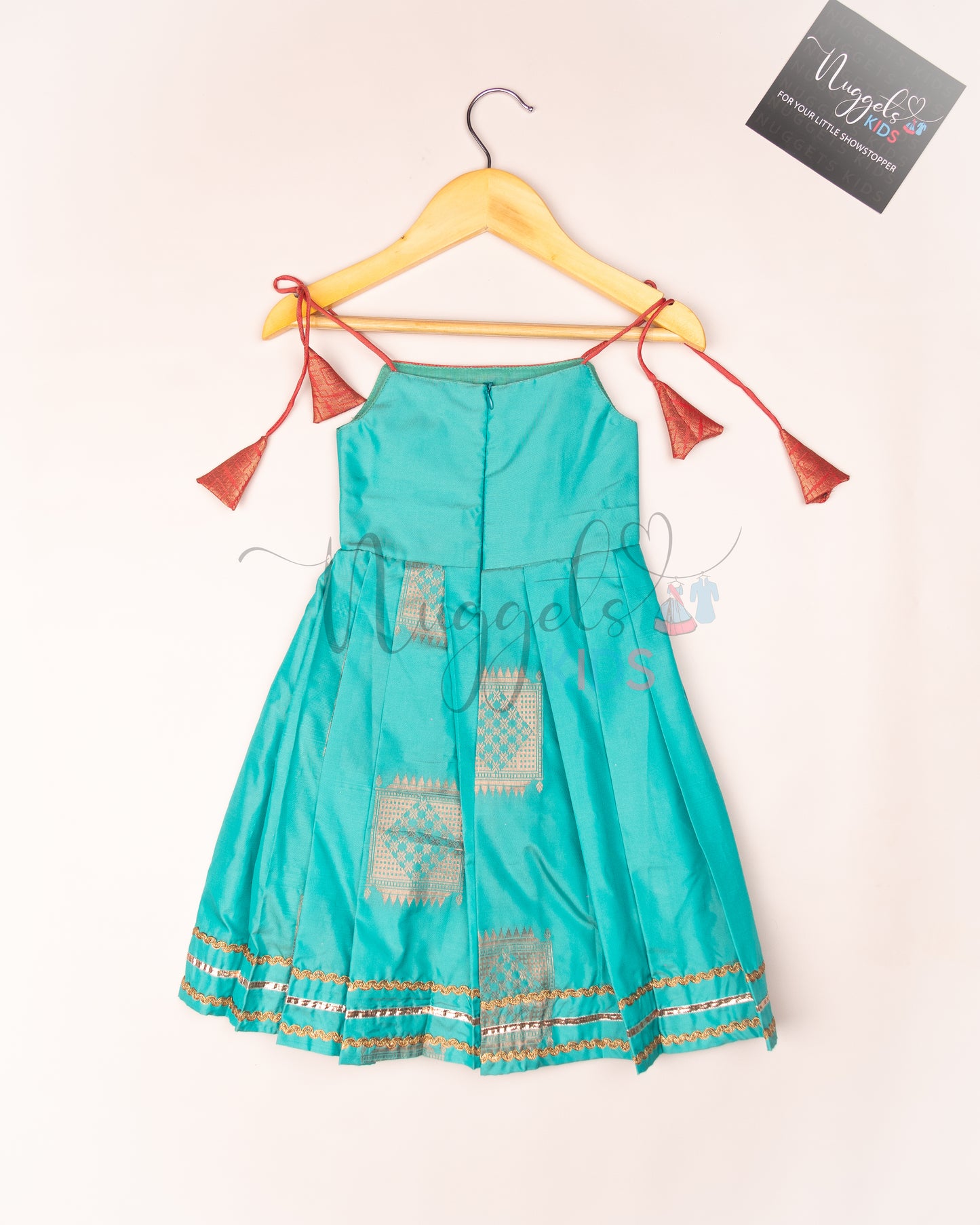 Ready to Ship: Sea Blue Semi Silk Tie up frock with patch work yoke, Potli button and lace detailing