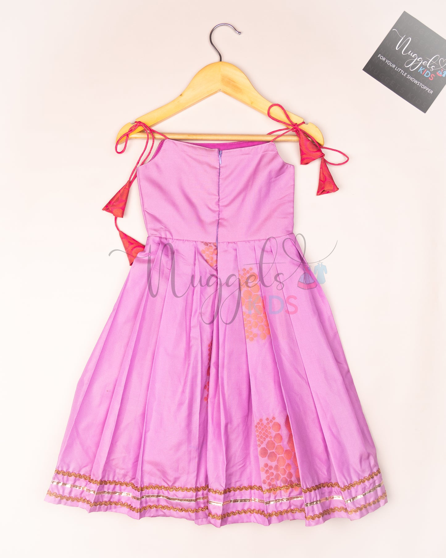 Ready to Ship: Lavender Semi Silk Tie up frock with patch work yoke, Potli button and Lace detailing