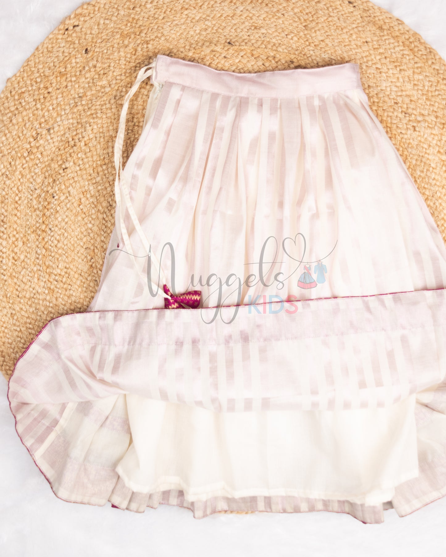 Pre Order: Designer Pleated Pink Kasavu Skirt with secret pleats on the sides and brocade puff sleeved crop top