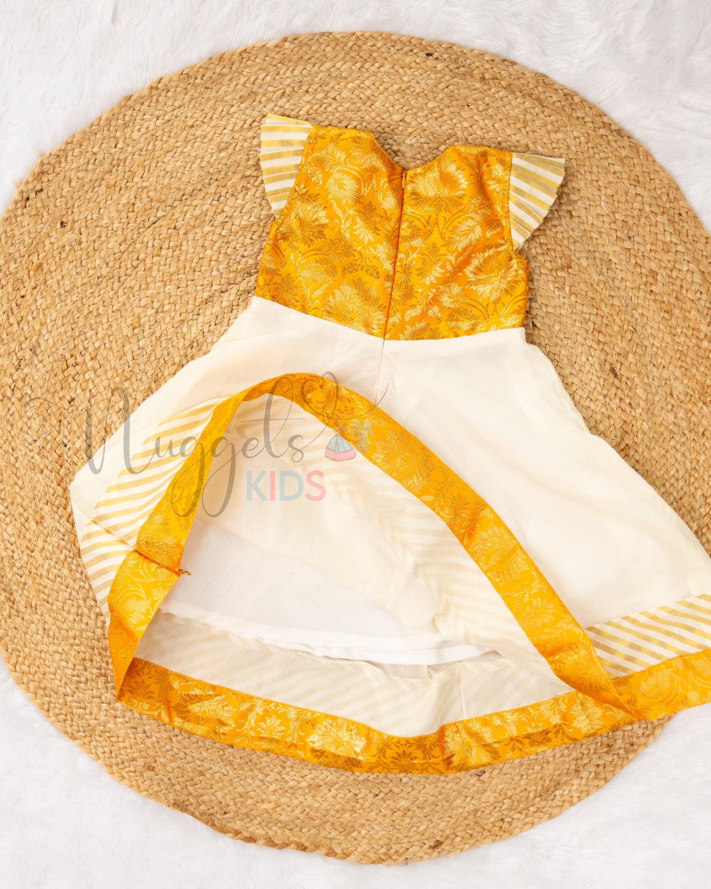 Pre Order: Stylish Kasavu Frock with v-necked Yellow Brocade yoke, pleated cap sleeves and attached double borders