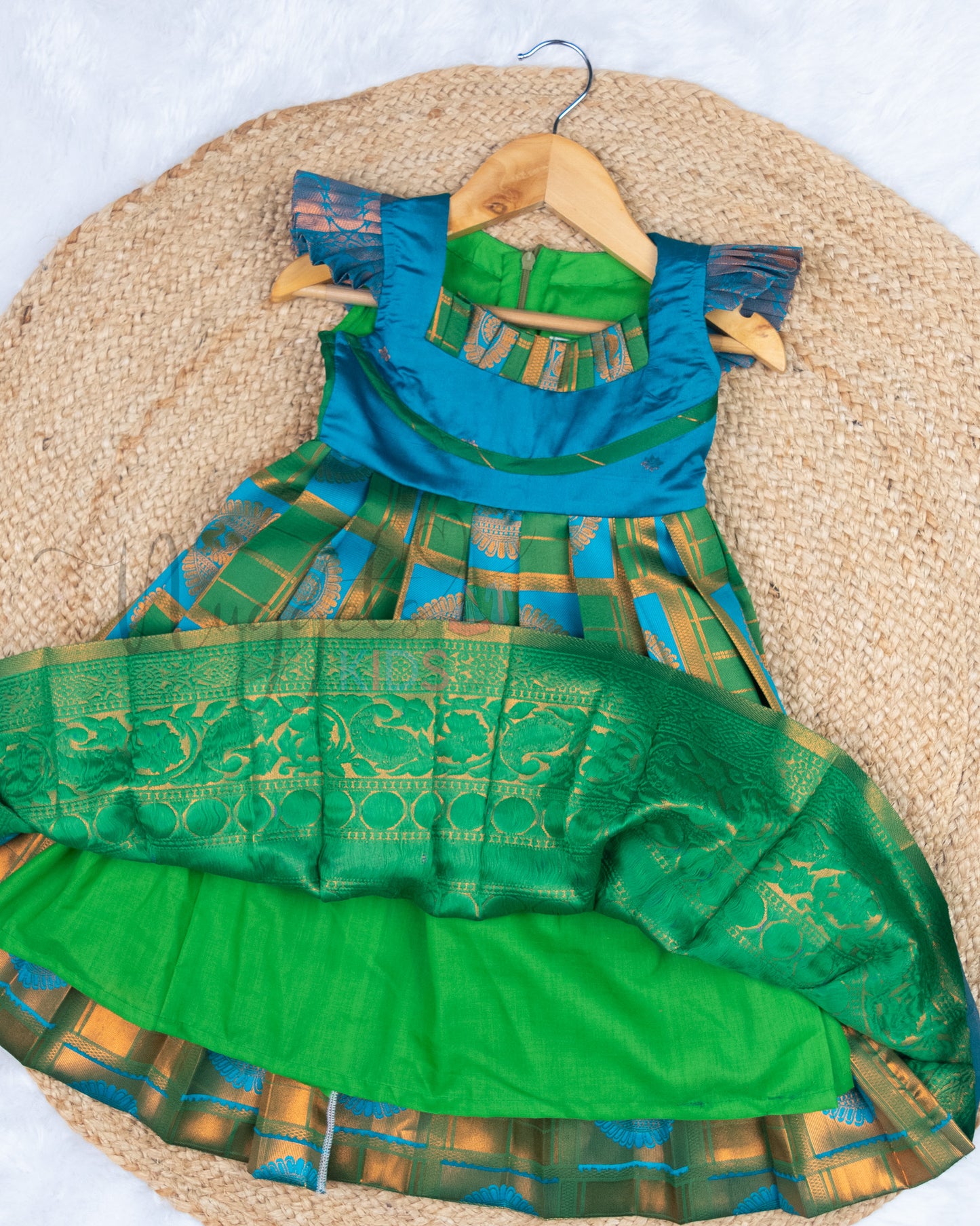 Ready to Ship: Blue and Green Checks Kanchi Meenakari Semi Silk frock with patch work pleated yoke (Blue), big zari borders and ruffle sleeves