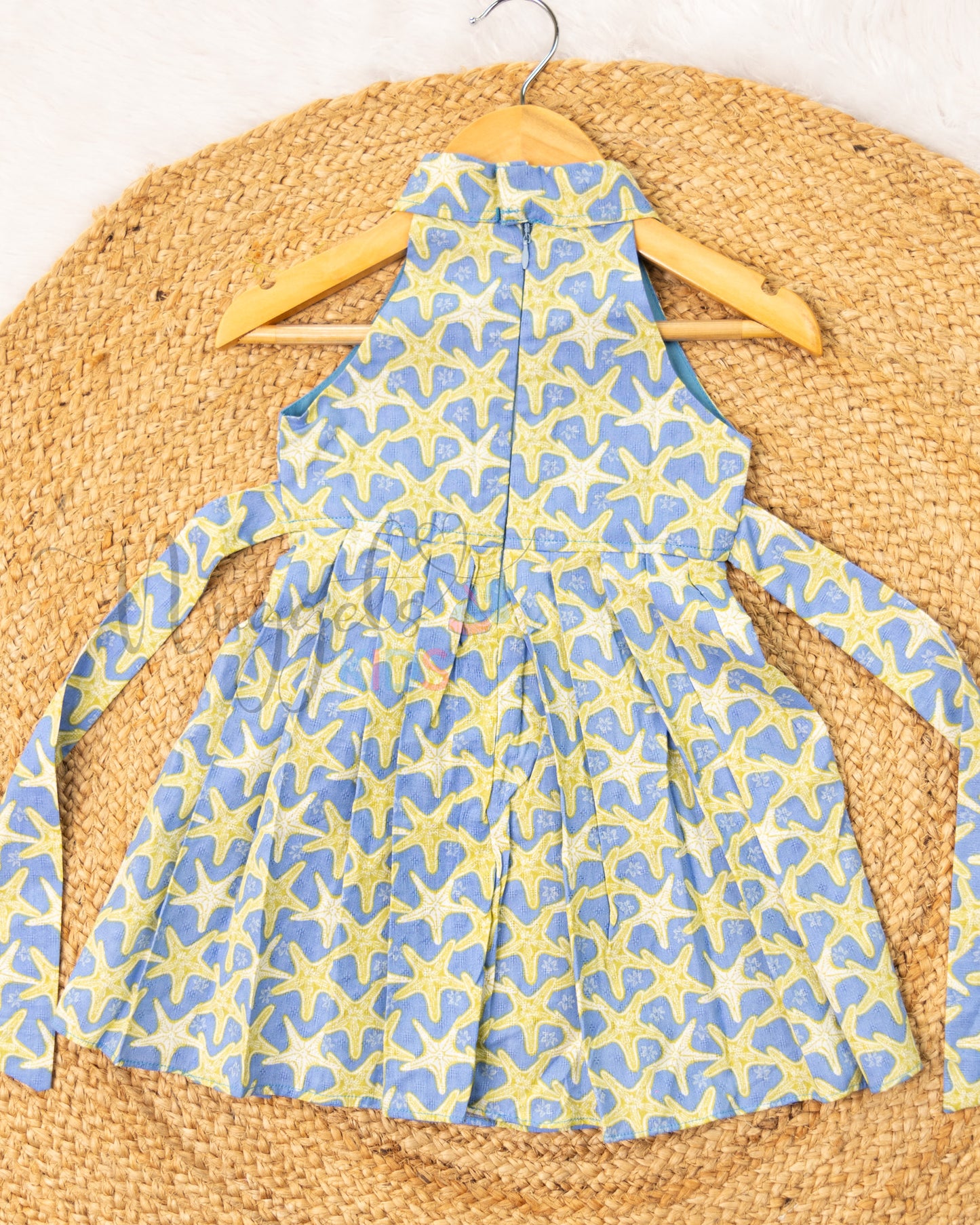 Ready to Ship: Sky Blue Star Halter neck Frock with Designer flap and Intricate pleats