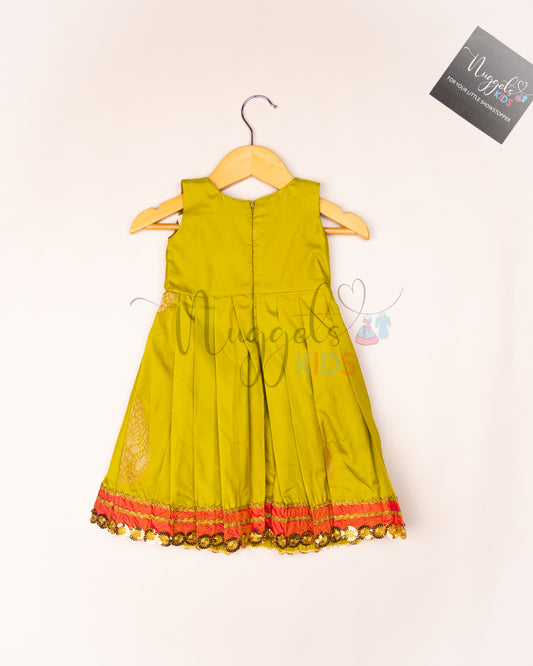 Ready to Ship: Soft Semi Silk Elaichi Green frock with patch work yolk, potli button and patch work hem with lace detailing