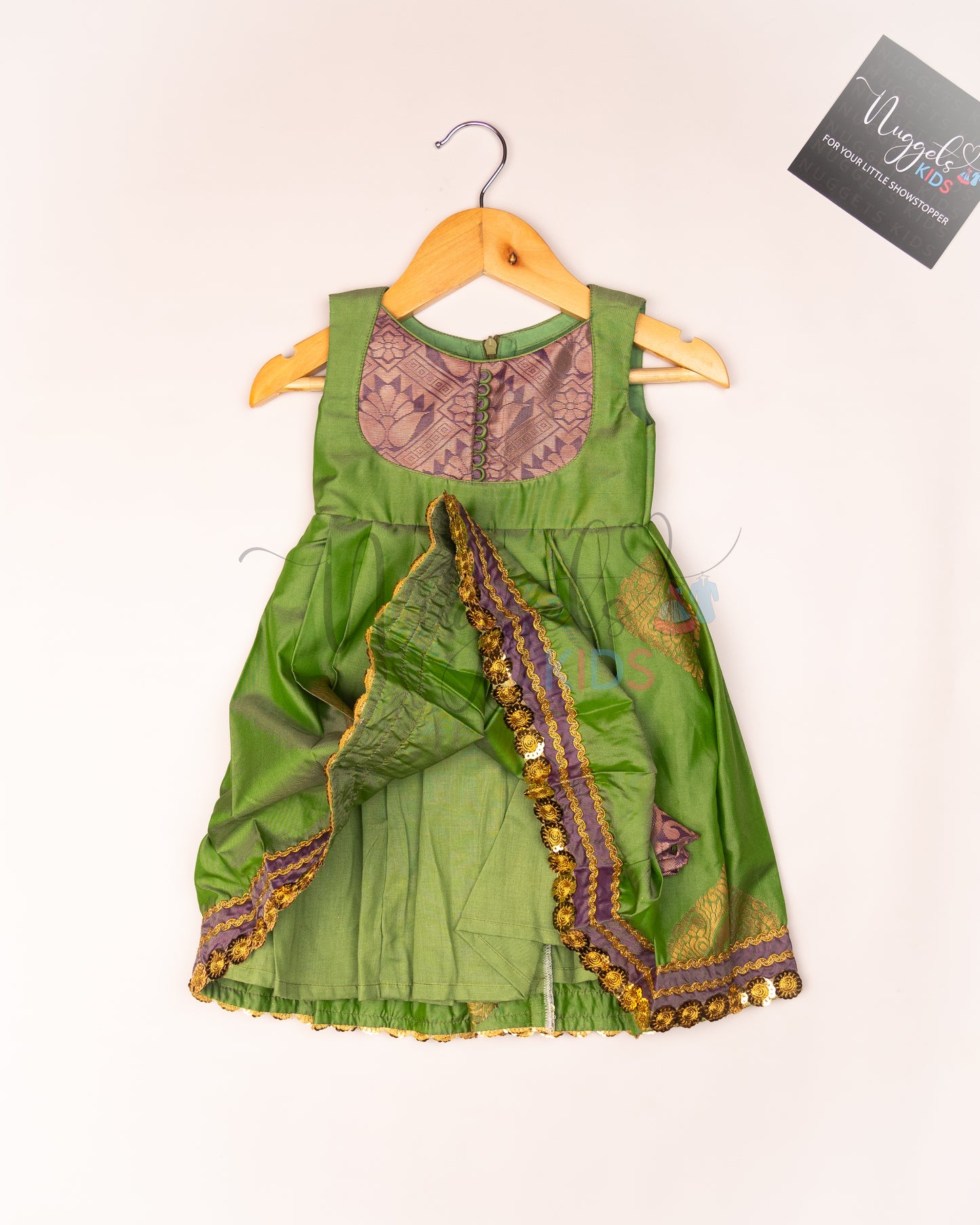 Ready to Ship: Olive Green Soft Semi Silk frock with patch work yolk, potli button and patch work hem with lace detailing