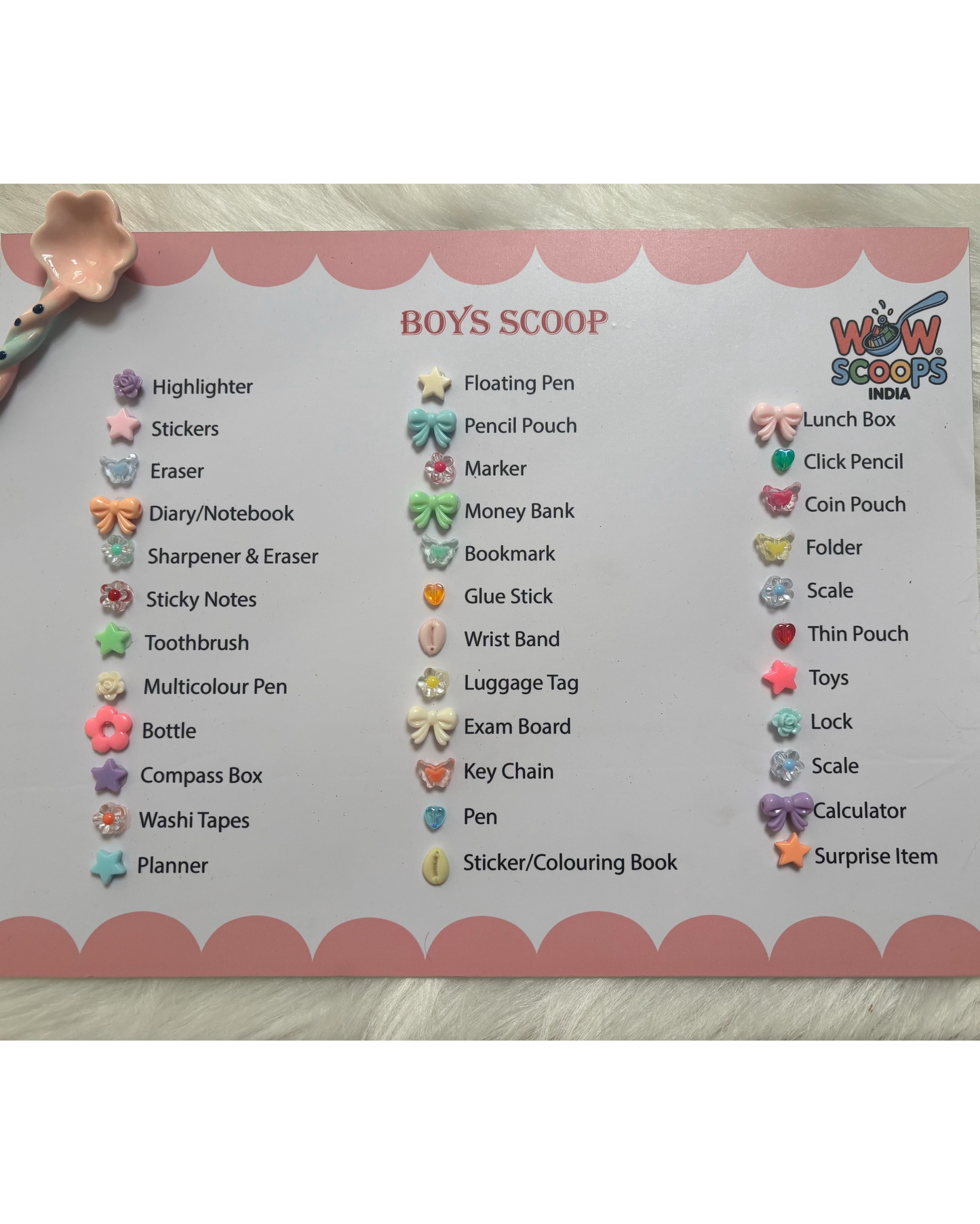 Boy's Scoop checklist with various stationery items on a light wooden surface
