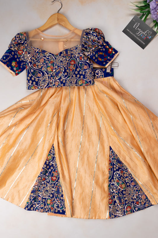 Pre Order: Beige sequined lehenga with patch work detailing and blue designer dola silk blouse with puff sleeves and sweetheart neckline