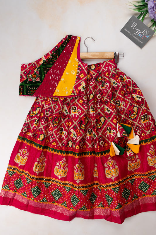 Pre Order: Multicolor Patola lehenga and patchwork designer blouse with one shoulder sleeves