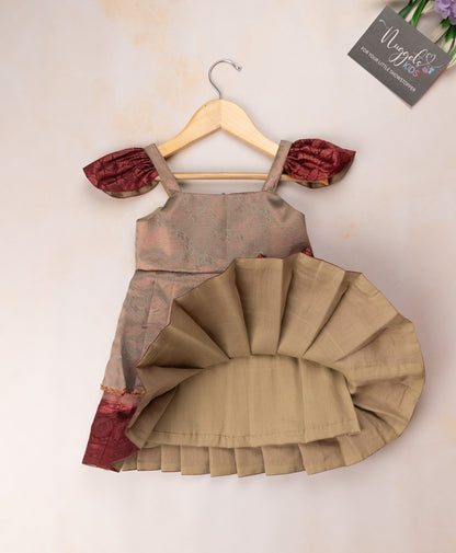 Ready to Ship: Two layered semi silk newborn frock with all over copper and lavender zari, bow detailing and ruffled cap sleeves
