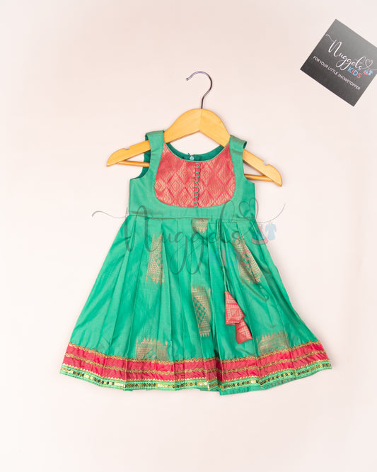 Ready to Ship: Pista Green Soft Semi Silk frock with patch work yolk, potli button and patch work hem with lace detailing
