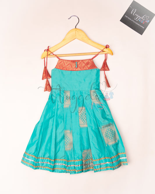 Ready to Ship: Sea Blue Semi Silk Tie up frock with patch work yoke, Potli button and lace detailing
