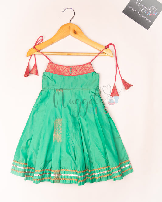 Ready to Ship: Pista Green Semi Silk Tie up frock with patch work yoke, Potli button and lace detailing