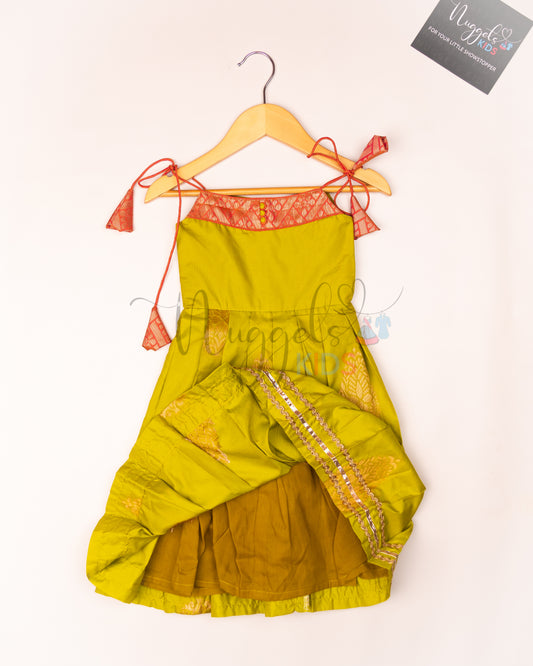 Ready to Ship: Elaichi Green Semi Silk Tie up frock with patch work yoke, Potli button and Lace detailing