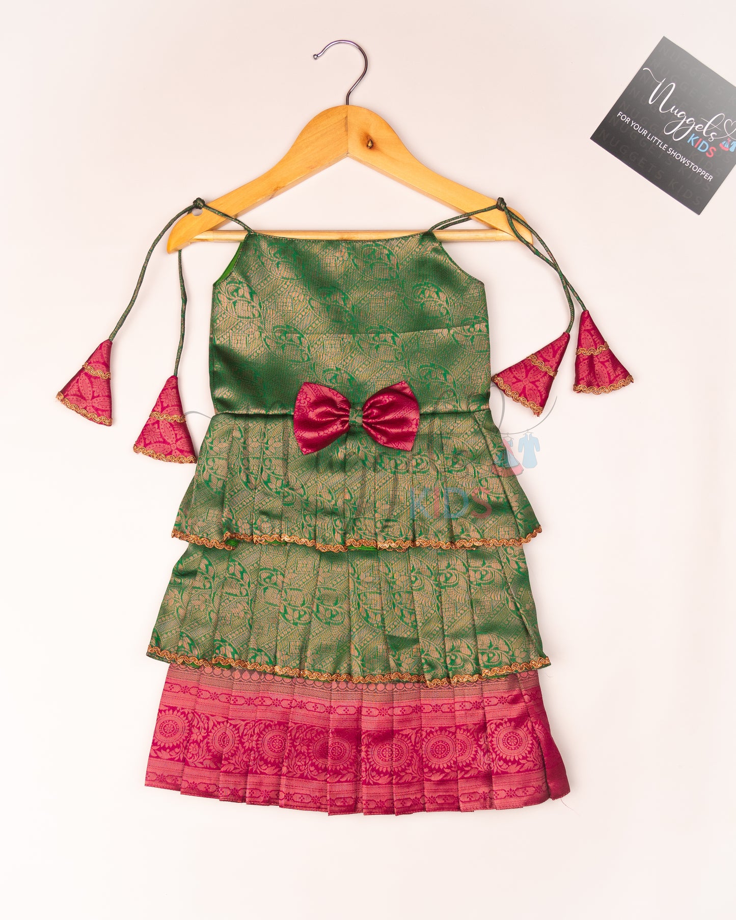 Ready to Ship: Parrot Green and Pink Tri layered semi silk newborn tie up frock with all over copper and lavender zari and bow detailing