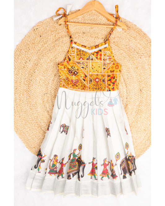 Pre Order: Designer Tie up Frock with Patola sequined yoke and printed silver Kasavu Tissue flare