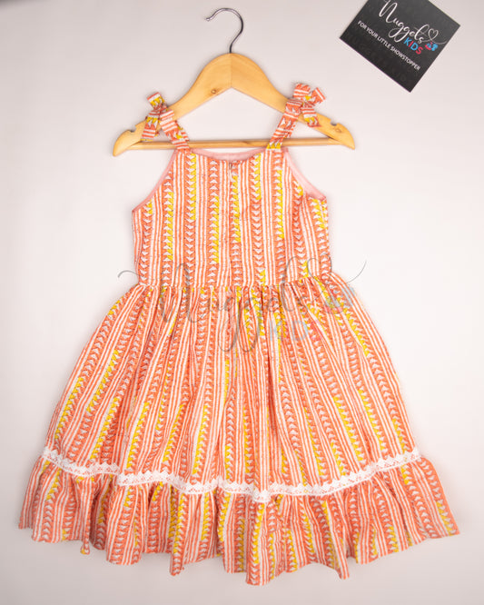 Ready to Ship: Coral Kantha Sleeveless Frock with multilayered lace detailing in the yoke and flare, and attached bows in the shoulder strap