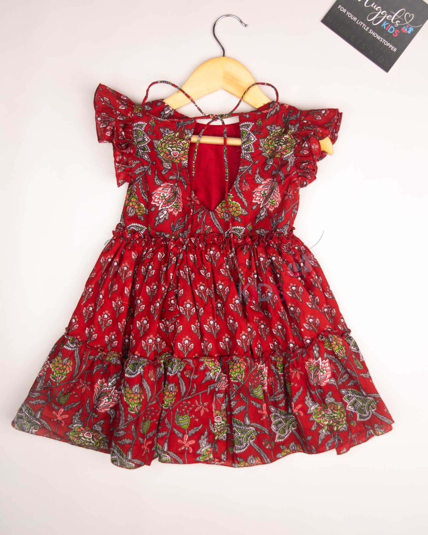 Ready to Ship: Maroon Floral Printed Cotton Frock with ruffle sleeves, headel frill flare and rope tie at the back