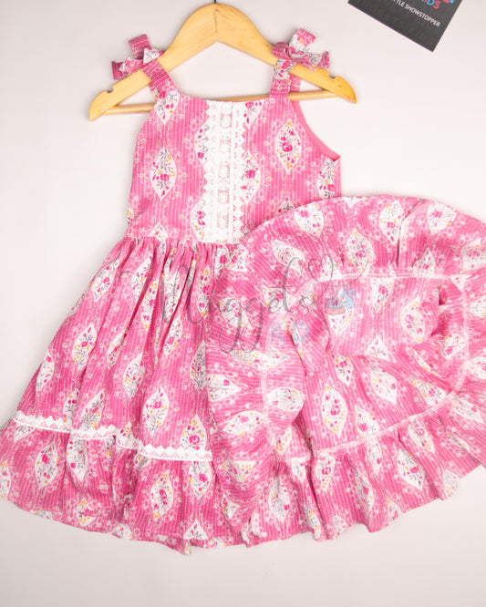 Ready to Ship: Pink Kantha Sleeveless Frock with multilayered lace detailing in the yoke and flare, and attached bows in the shoulder strap