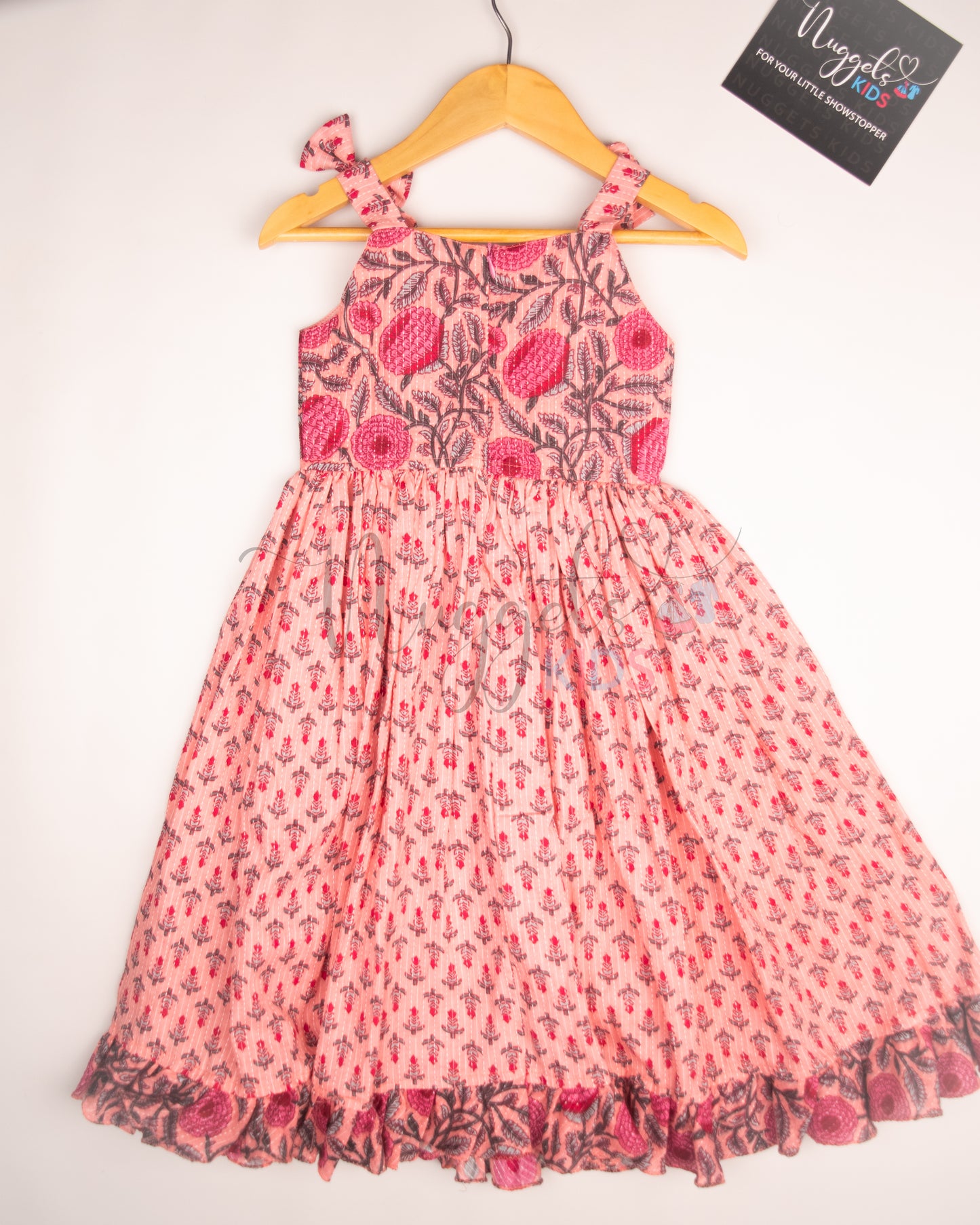 Ready to Ship: Mauve Kantha Sleeveless Frock with patchwork yoke, shoulder bows and ruffle flare