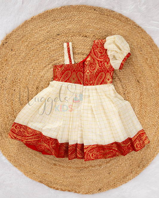 Pre Order: One Shoulder Checked Kasavu Frock with Red Brocade yoke, puff sleeves and attached borders