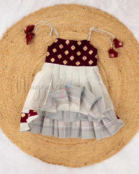 Pre Order: Silver Tissue Pleated Tie-up Kasavu Frock with Jamun Soft Organza Yoke