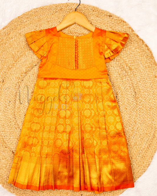 Ready to Ship: Orange Banarasi Semi Silk frock with patch work designer yoke, Potli button and pleated cap sleeves