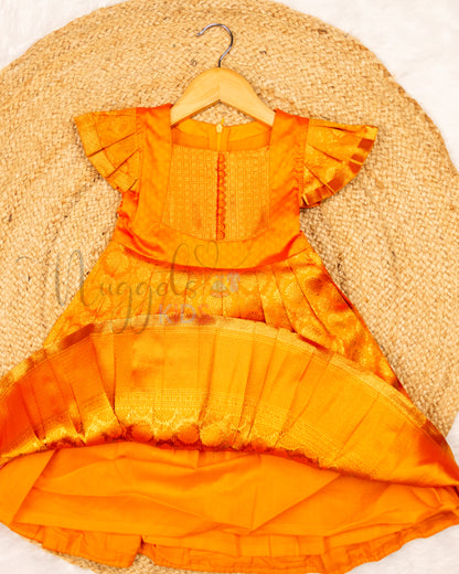 Ready to Ship: Orange Banarasi Semi Silk frock with patch work designer yoke, Potli button and pleated cap sleeves