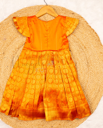 Ready to Ship: Orange Banarasi Semi Silk frock with patch work designer yoke, Potli button and pleated cap sleeves