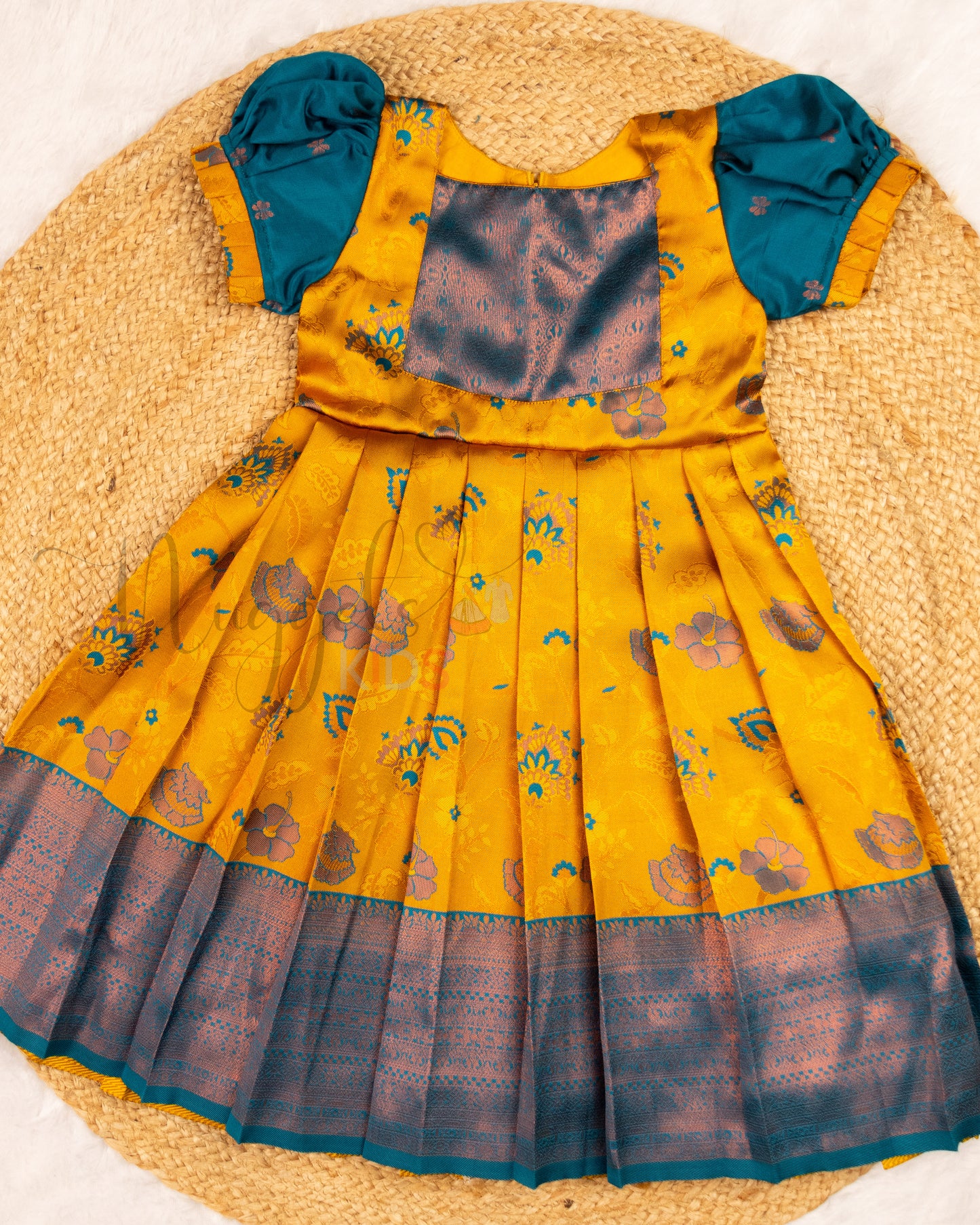 Ready to Ship: Yellow and Peacock Blue Kanchi Meenakari Semi Silk frock with patch work yoke, big zari borders and puff sleeves with pleated ends