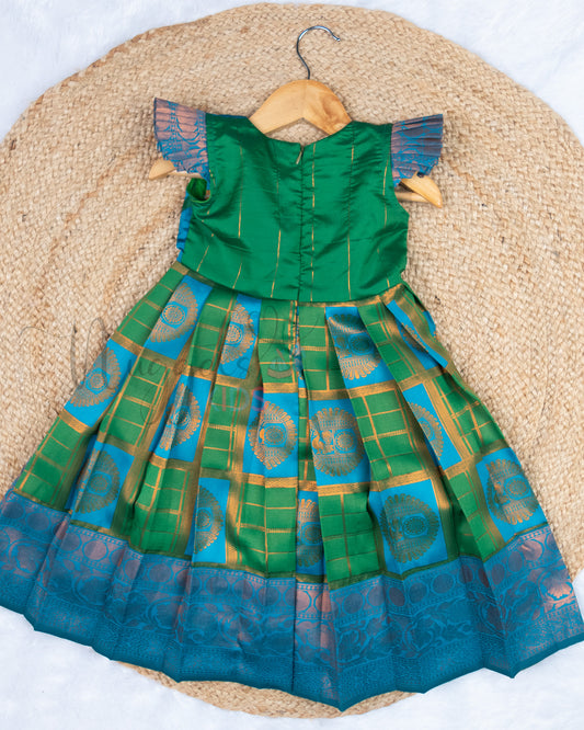 Ready to Ship: Blue and Green Checks Kanchi Meenakari Semi Silk frock with patch work pleated yoke (Blue), big zari borders and ruffle sleeves