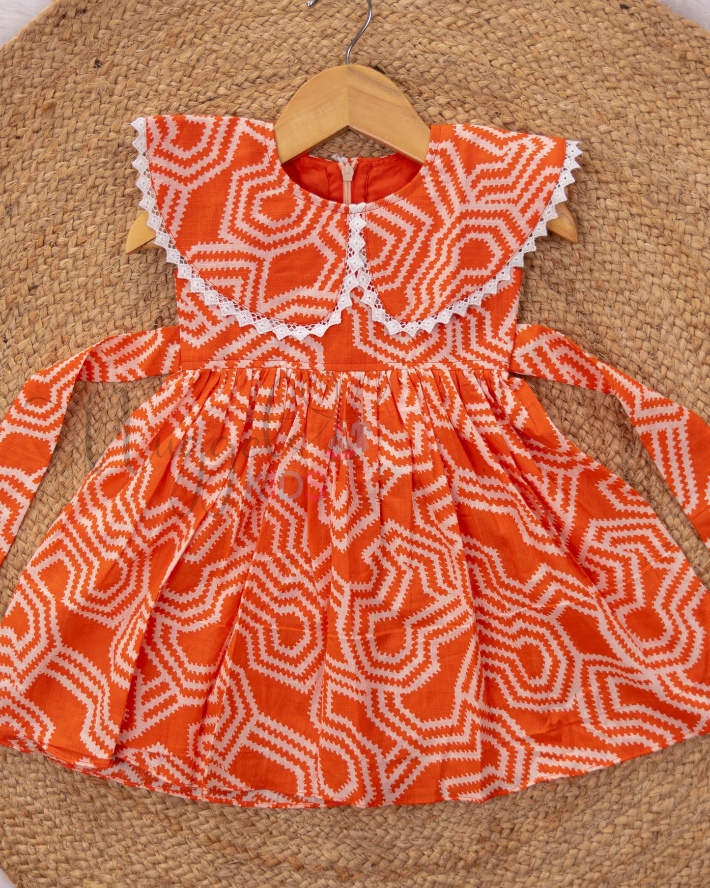 Ready to Ship: Orange Digital Cotton frock with lace embellished Cape style yoke