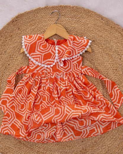 Ready to Ship: Orange Digital Cotton frock with lace embellished Cape style yoke