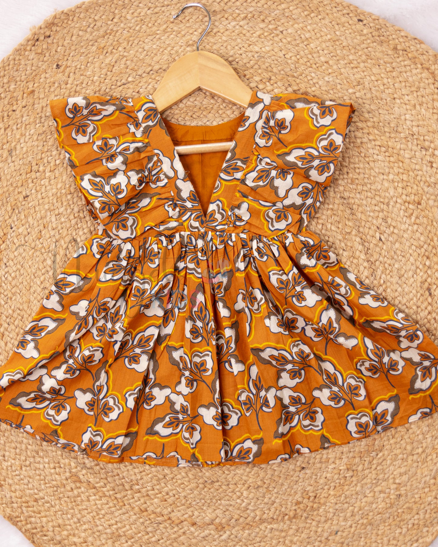 Ready to Ship: Ruffle winged digital cotton frock with beautiful leaf prints and a deep V back neck