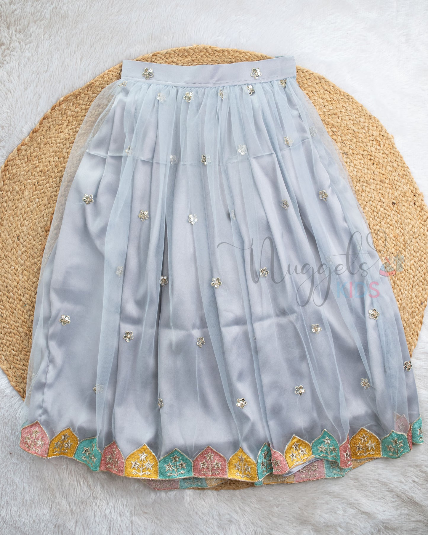 Pre Order: Dusky Pink Top And Ice Blue Lehenga Set