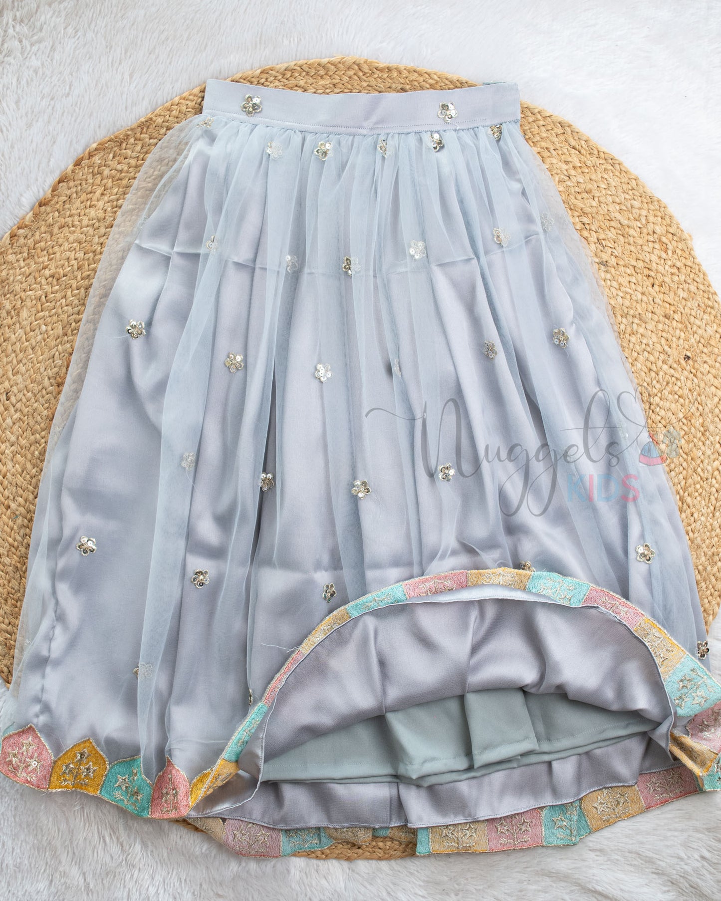 Pre Order: Dusky Pink Top And Ice Blue Lehenga Set
