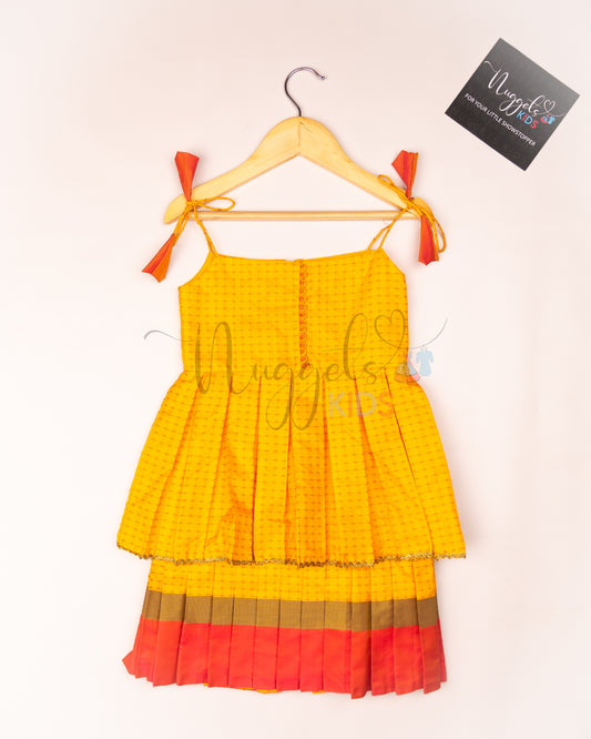 Ready to Ship: Yellow and Peach Two layered semi silk tie-up frock with potli buttons and lace detailing