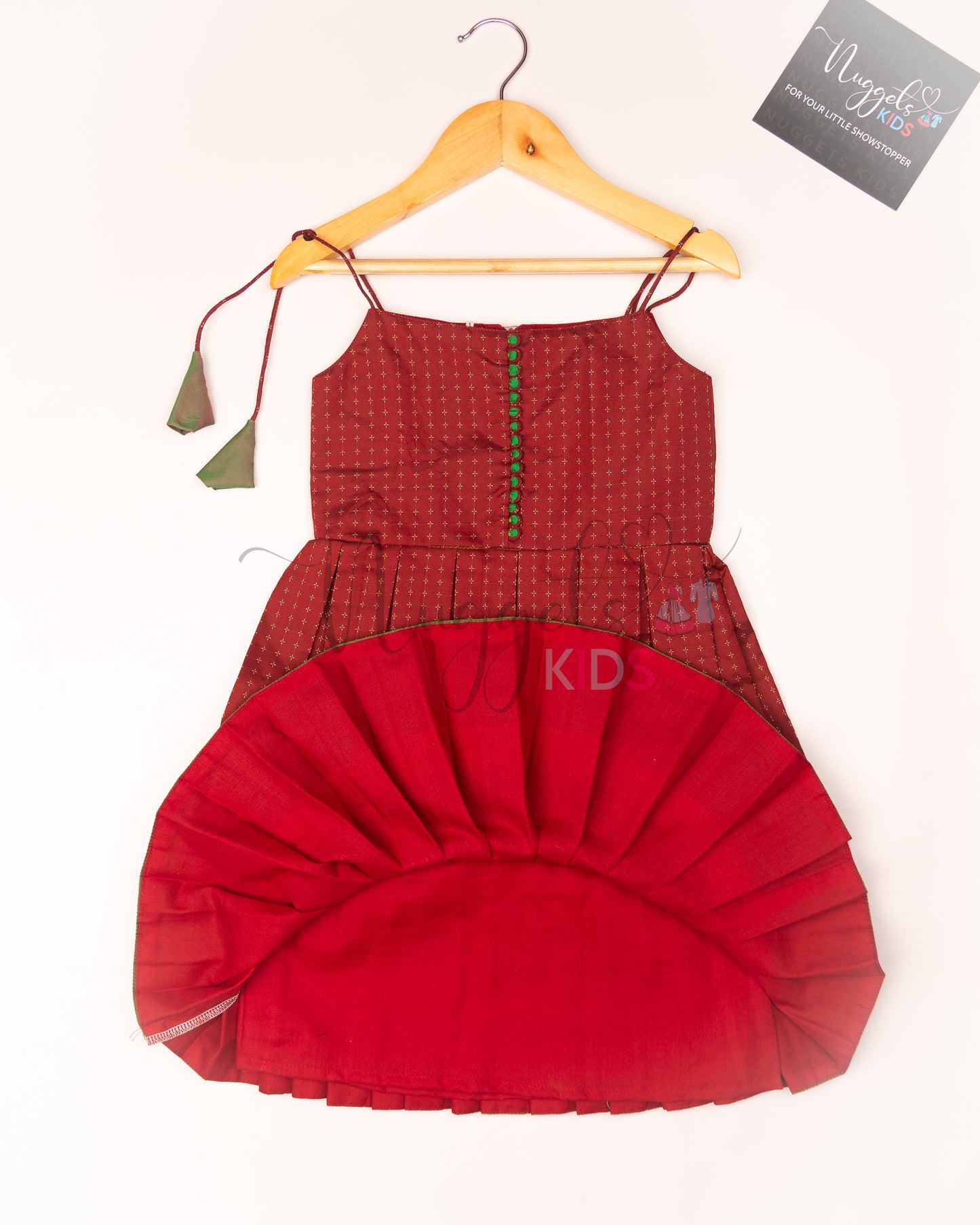 Ready to Ship: Red and Green Two layered semi silk tie-up frock with potli buttons and lace detailing